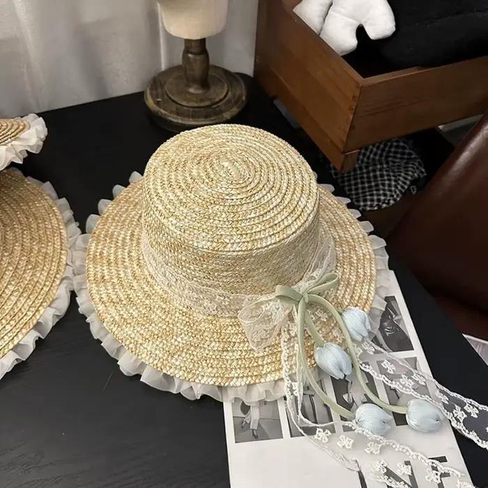 Chapeau de paille à large bord avec nœud en dentelle et fleur, protection UV, idéal pour le printemp