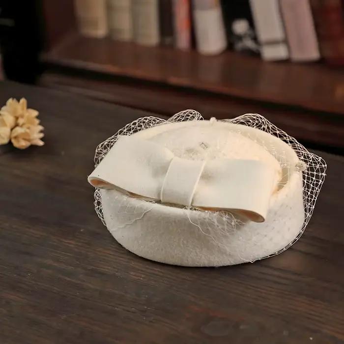 Chapeau à nœud en laine avec voile pour femme, casquette d'hôtesse de l'air en cachemire pour l'hive