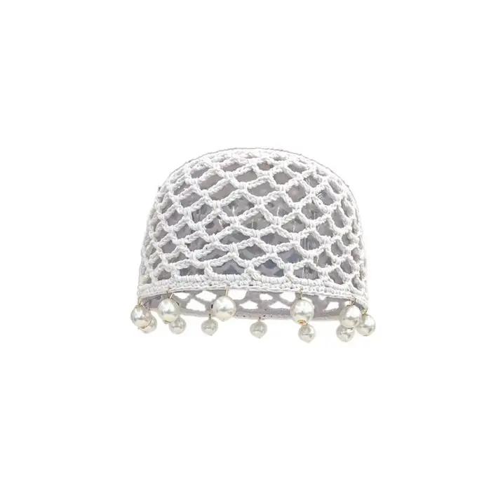 Bonnet tricoté ajouré style bohème et ethnique