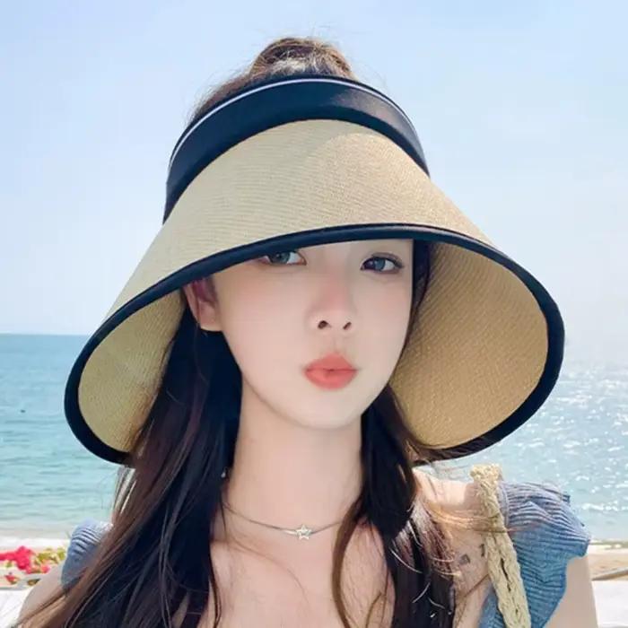 Chapeau de soleil élégant pliable en paille tressée à bord large