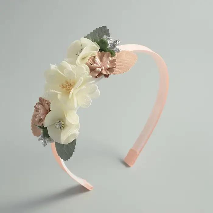 Nouveau serre-tête en perles et plumes fait main
