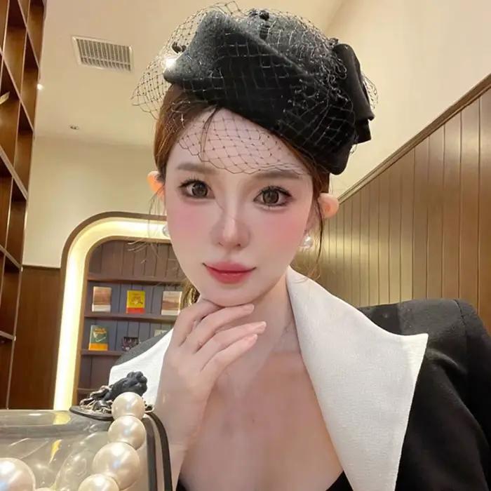 Chapeau à nœud en laine de style britannique vintage avec voile
