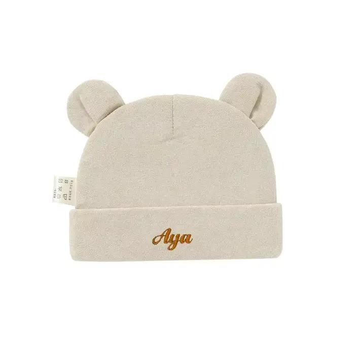 Bonnet en coton biologique pour nouveau-né avec nom personnalisé