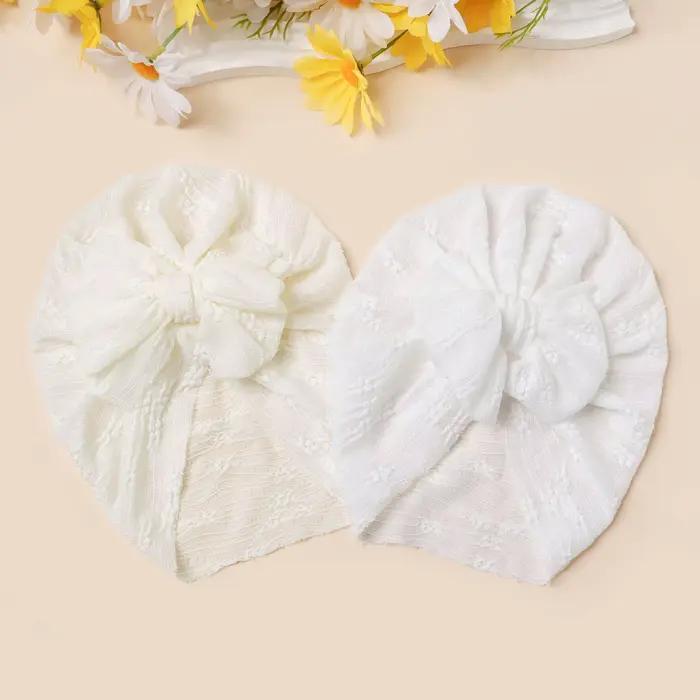 Chapeau en maille pour bébé