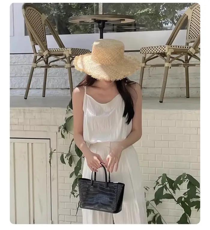 Chapeau de plage en raphia naturel fait à la main pour femme protection solaire large bord plage vacances été printemps