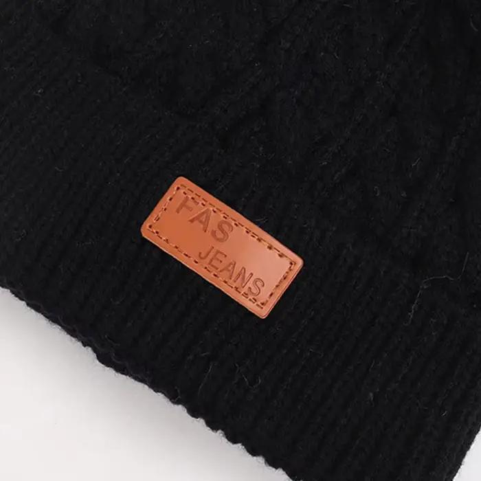 Bonnet double pompon en laine pour enfants