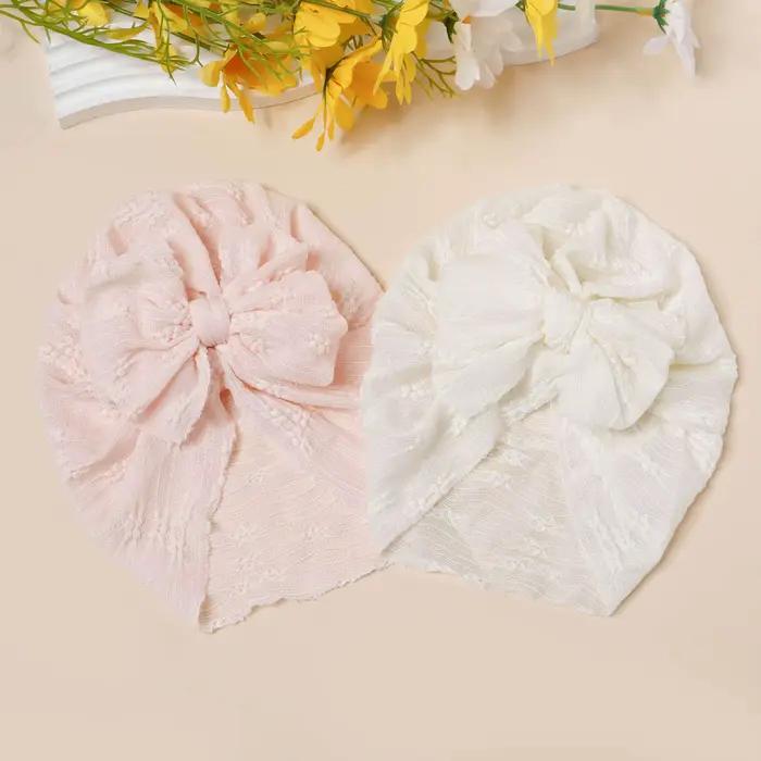 Chapeau en maille pour bébé