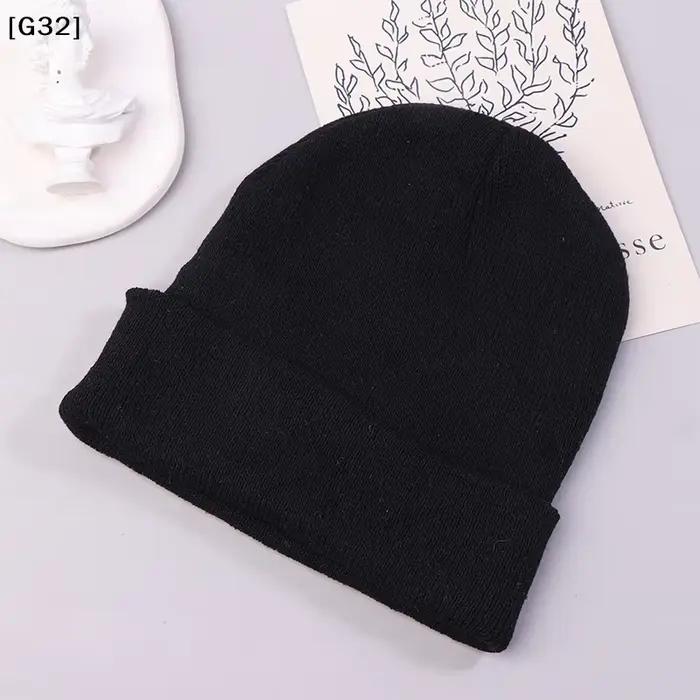 Bonnet en laine tricoté noir