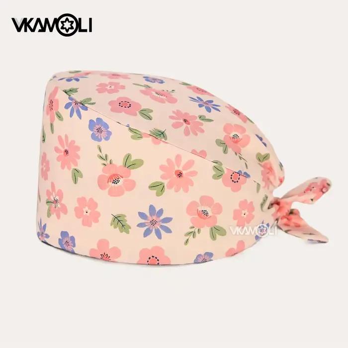 Chapeau de gommage imprimé fleur rose