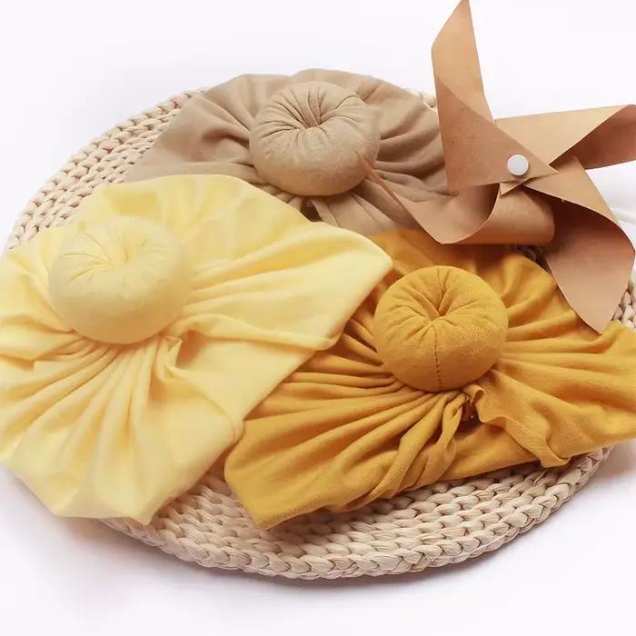 Chapeau turban bébé unisexe en coton pour filles et garçons 0-1 an accessoire de cheveux pour enfants mignon turban noué pour nouveau-né occasions spéciales