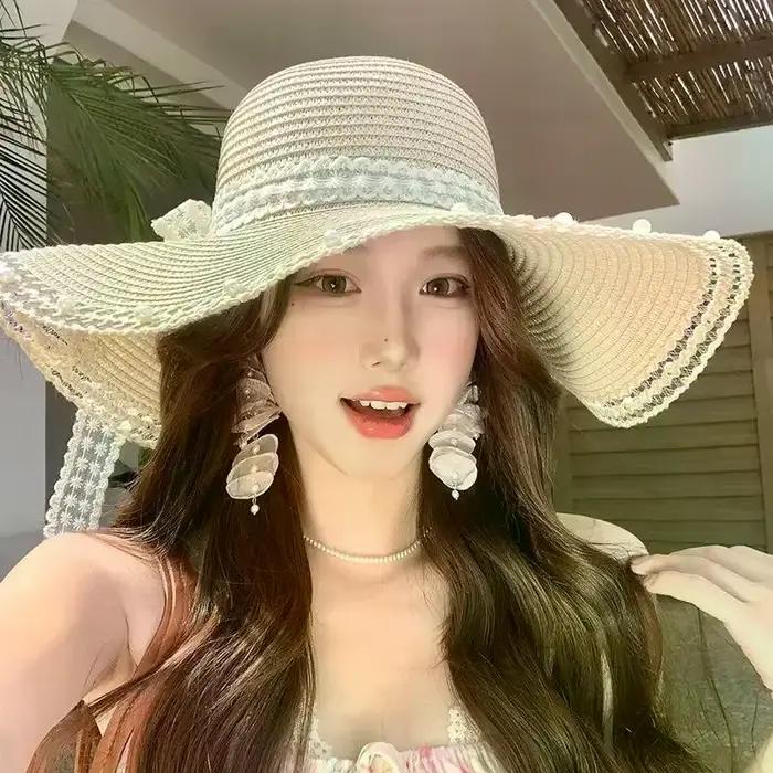 Chapeau de paille pour femme à grand bord avec nœud décoratif