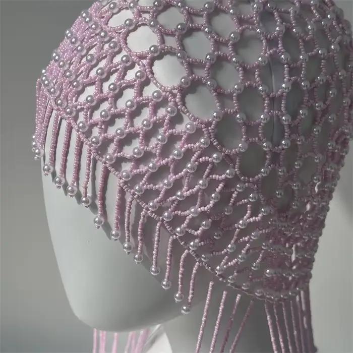 Chapeau tricoté vintage rose ajouré avec perles