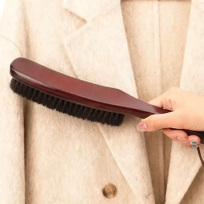 Brosse en feutre avec manche en bois