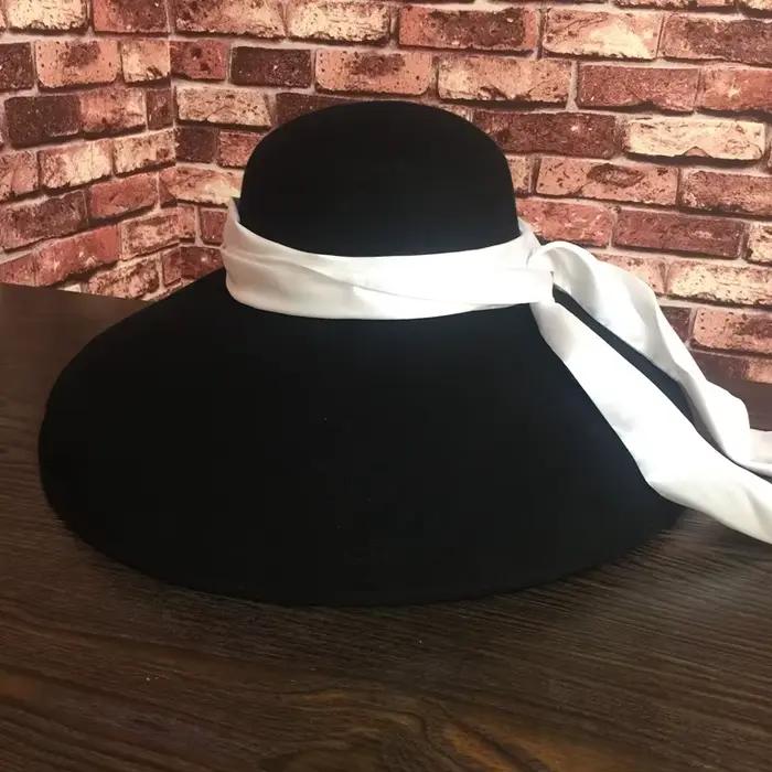 Chapeau seau en laine noir à large bord pour femme