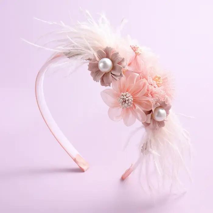 Nouveau serre-tête en perles et plumes fait main
