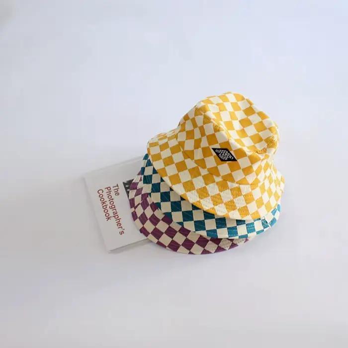 Chapeau seau à motif damier pour enfants