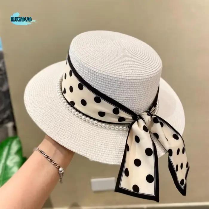Chapeau de plage élégant en paille tressée avec perles