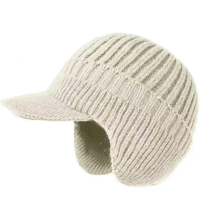 Bonnet en tricot chaud d'hiver avec bordure et rabat pour les oreilles