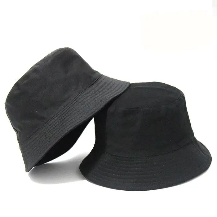 Chapeau seau noir à pois solides