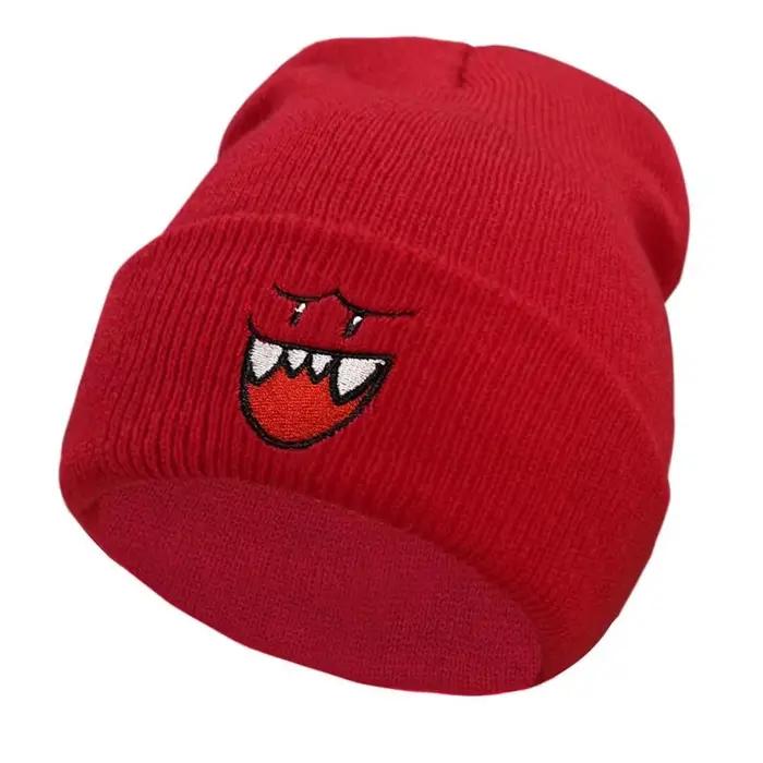 Chapeau tricoté brodé Happy Face