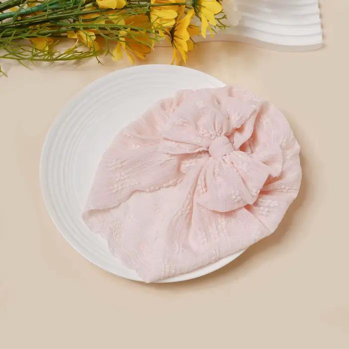 Chapeau en maille pour bébé