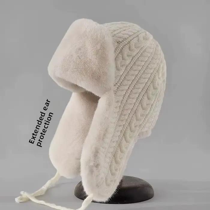 Chapeau en tricot pour femmes avec oreillettes étendues