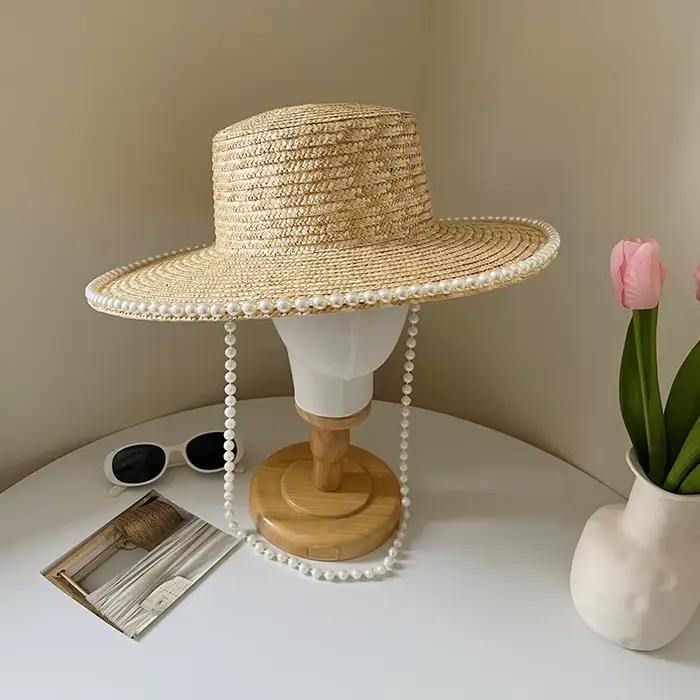 Chapeau de soleil français à large bord printemps-été 2026 avec chaîne de perles