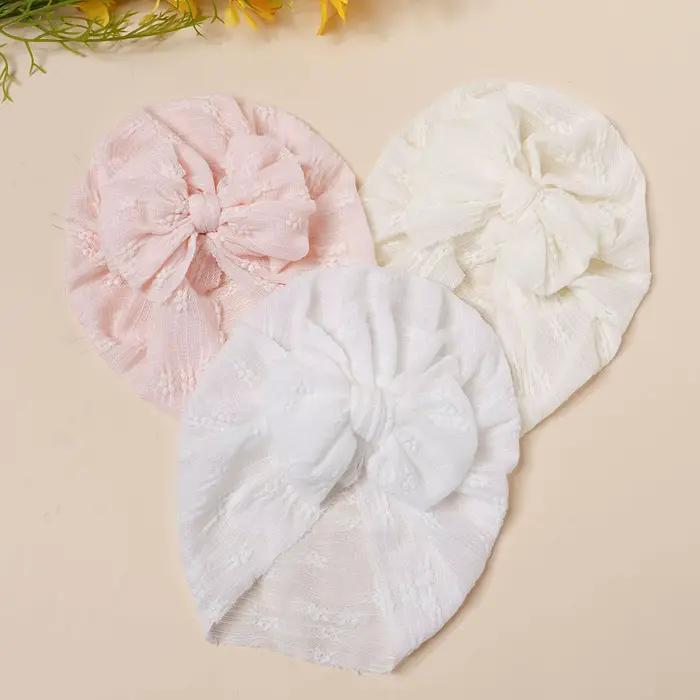 Chapeau en maille pour bébé