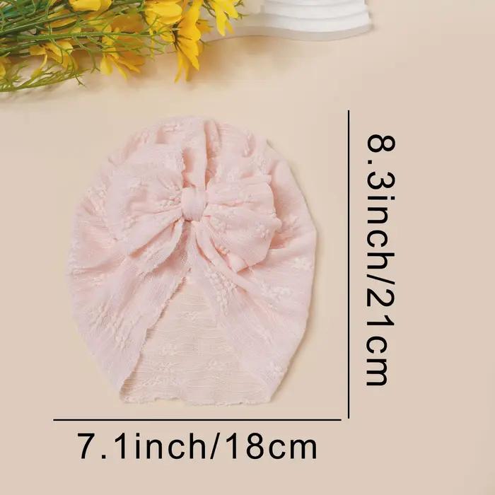 Chapeau en maille pour bébé