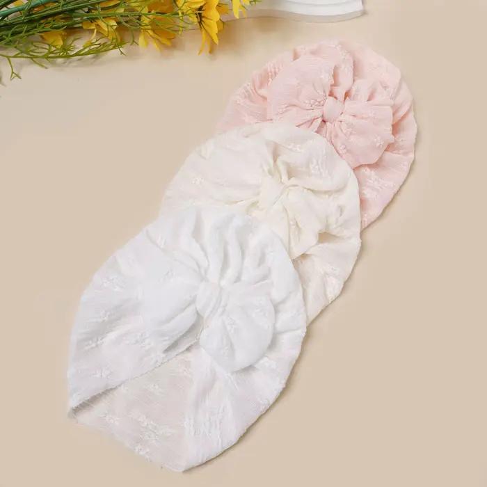 Chapeau en maille pour bébé