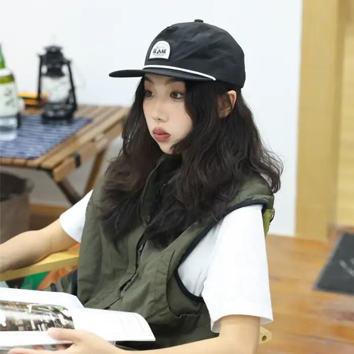 Casquette de baseball unisexe en nylon avec visière souple et design à bouton-pression pour passionnés de hip-hop occasions spéciales et activités extérieures
