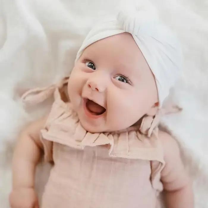 Chapeau turban bébé unisexe en coton pour filles et garçons 0-1 an accessoire de cheveux pour enfants mignon turban noué pour nouveau-né occasions spéciales