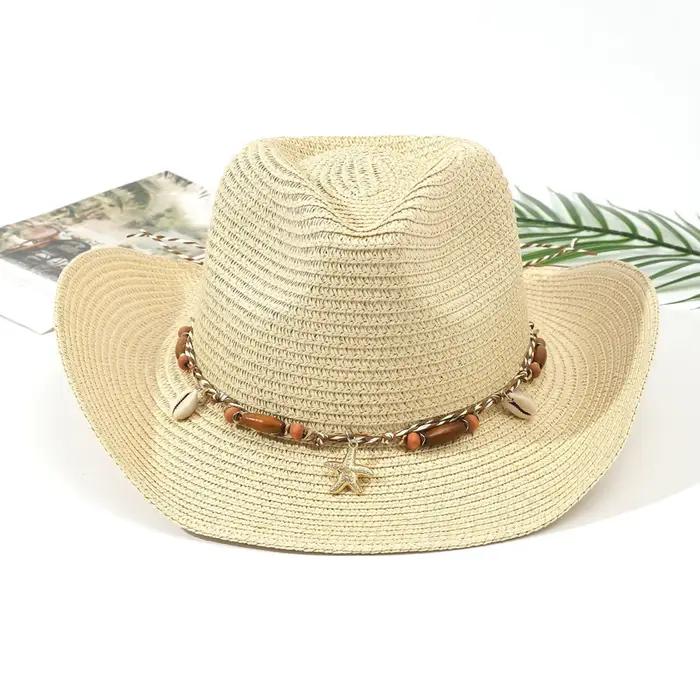Chapeau de cowboy en paille de style bohème avec décorations en forme d'étoile de mer et de coquilla