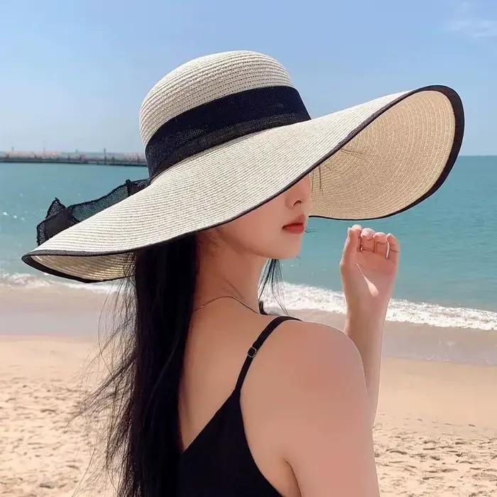 Chapeau de paille élégant à large bord pour femme