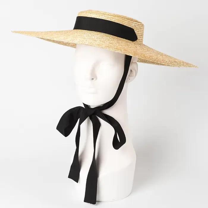 Chapeau d'été en paille à bord de 15cm avec ruban blanc