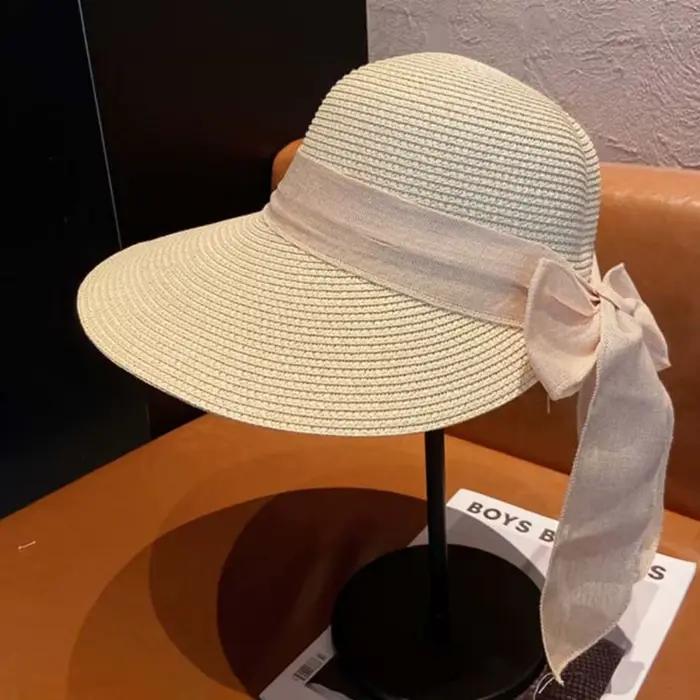 Chapeau de plage portable en paille tressée ajourée en polyester à large bord