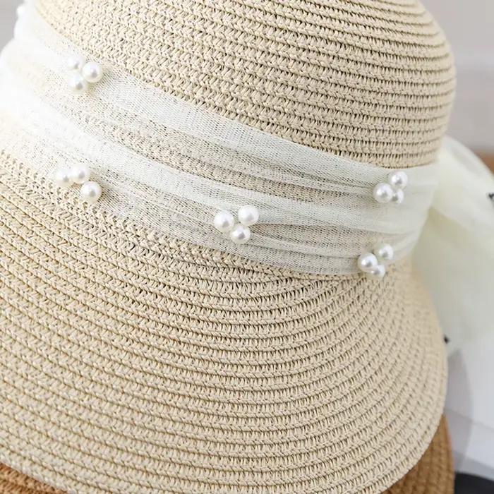 Chapeau de soleil en paille élégant avec nœud en maille de perles pour femmes