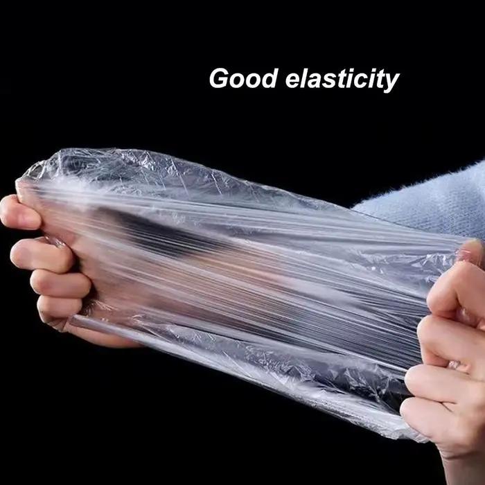 100/200 pièces de bonnets de douche jetables transparents