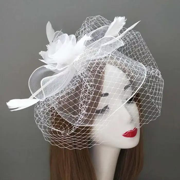 Fascinateur en maille de plumes vintage avec nœud