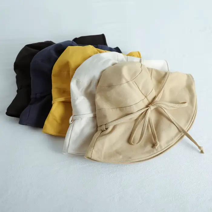 Chapeau de pêcheur pour femme avec nœud grand bord protection solaire visière anti-uv couleur unie extérieur plage été style sport coton polyester