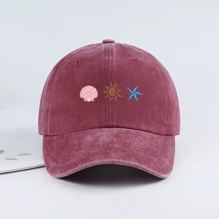 Casquette de baseball délavée avec imprimé coquillage et étoile de mer