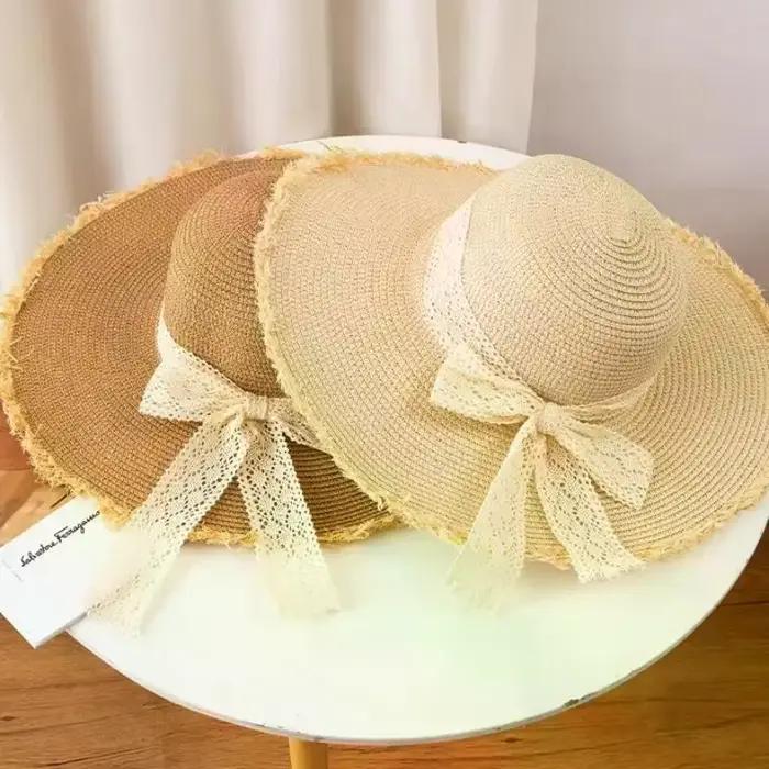 Chapeau de paille pour femme à grand bord avec nœud décoratif