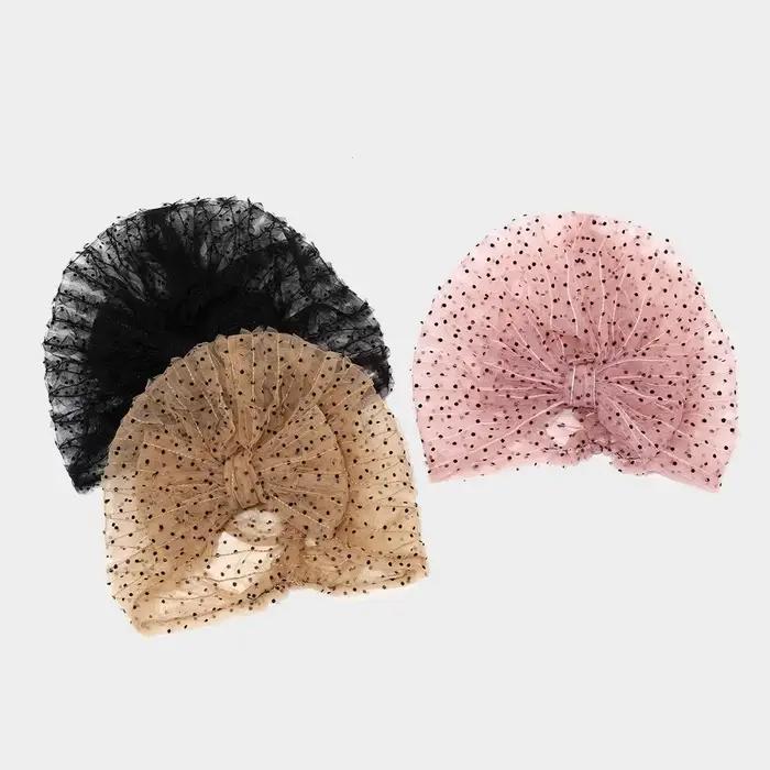 Bonnet en tissu respirant à pois en maille