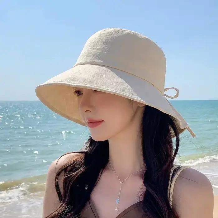 Chapeau de soleil exclusif à large bord pour femme avec nœud