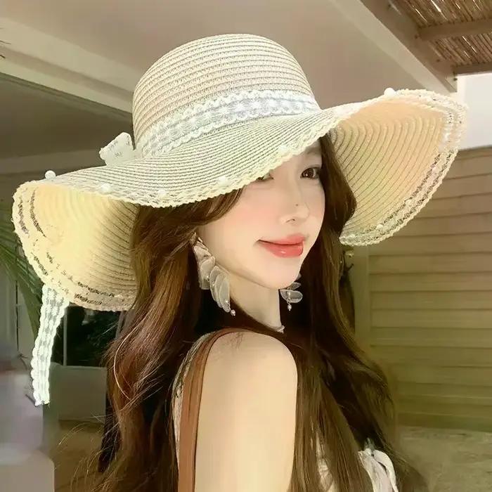 Chapeau de paille pour femme à grand bord avec nœud décoratif