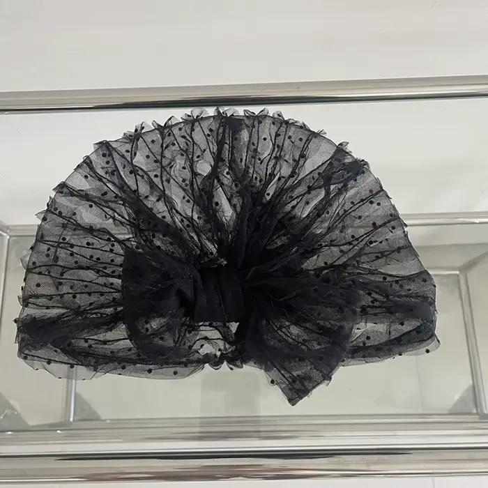 Bonnet en tissu respirant à pois en maille