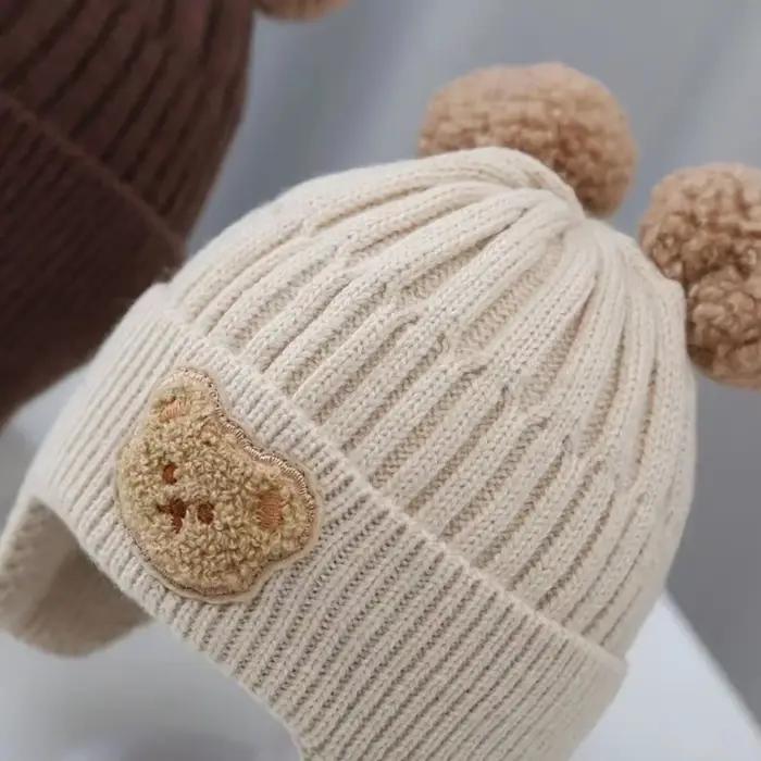 Chapeau de protection des oreilles d'ours en laine pour bébé