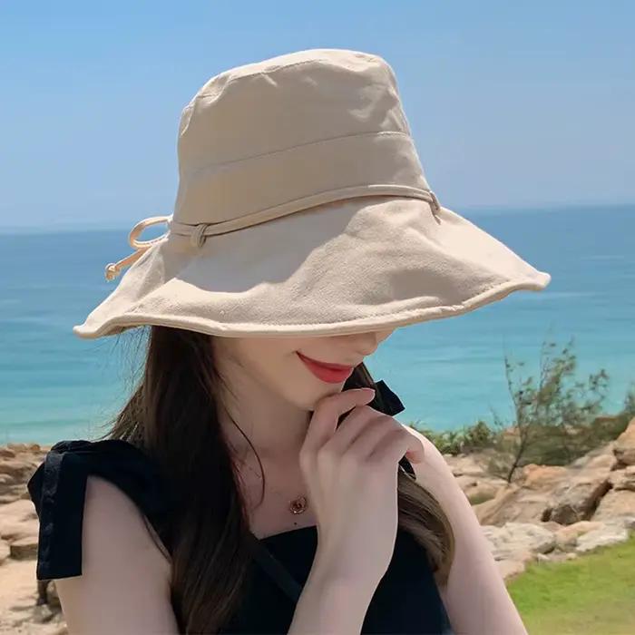 Chapeau de pêcheur pour femme avec nœud grand bord protection solaire visière anti-uv couleur unie extérieur plage été style sport coton polyester