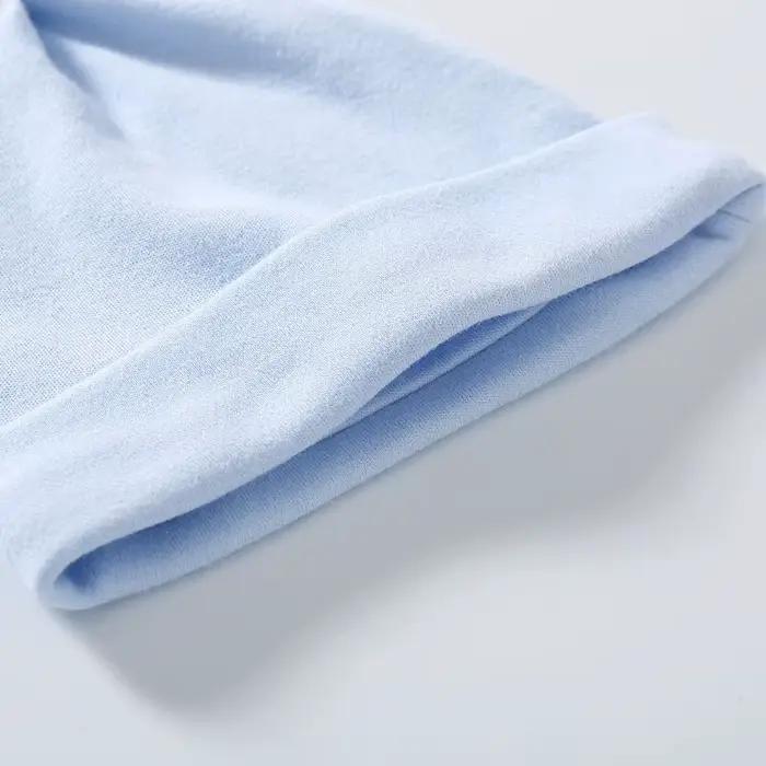 Bonnet en coton personnalisé pour nouveau-né avec nom brodé