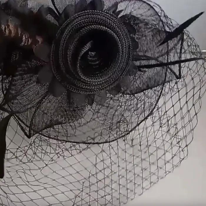 Fascinateur en maille de plumes vintage avec nœud